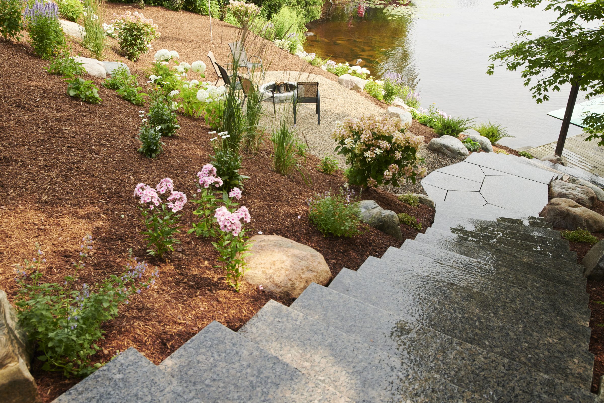 An outdoor garden with stone steps.